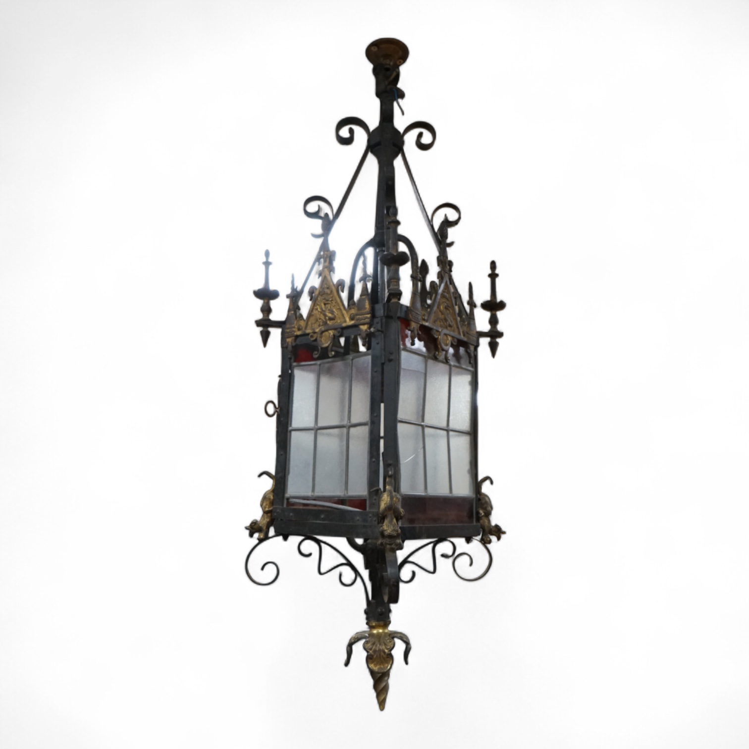 A large wrought iron and gilt bronze hall lantern, 94cm high